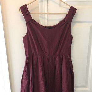 Sleevelss, full skirted dress w/ empire waist